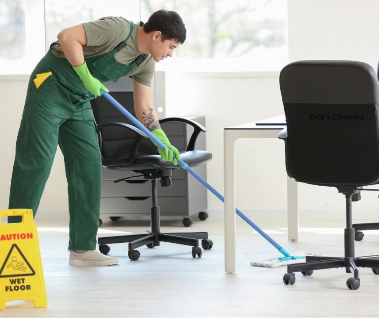 Man mopping office floor
